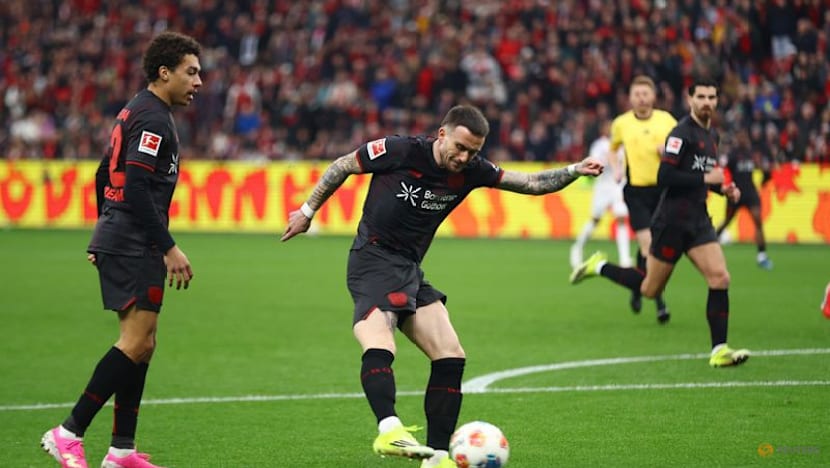 Nine-man Bayern come from behind to rescue 1-1 draw at Leverkusen