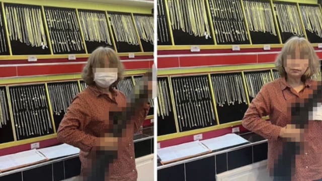 “我们今天开门了” 泰金店老板母亲持枪照引热议