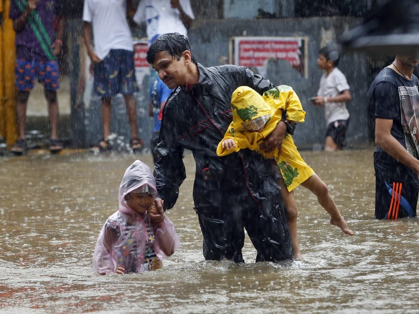 Gallery: Heavy rains in Mumbai cause water-logging, strands commuters ...