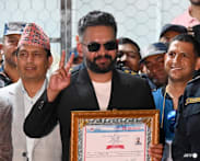Nepal PM marks 100 days with fast change and few words