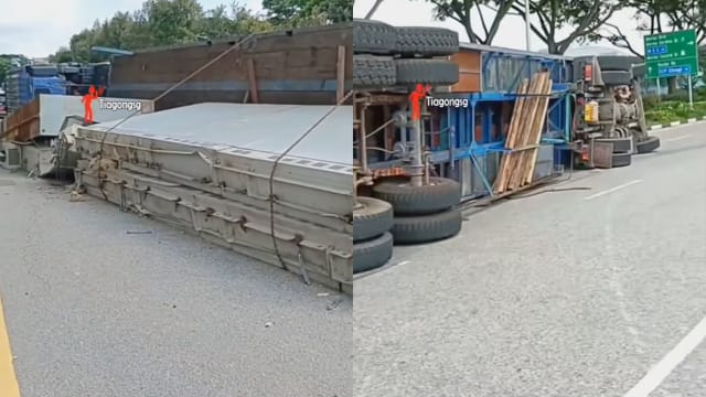 载着石灰板的拖车在薛尔思道侧翻