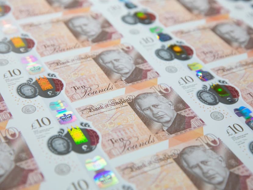 The production of the new King Charles III 10 note by the Bank of England is seen in this undated handout picture.