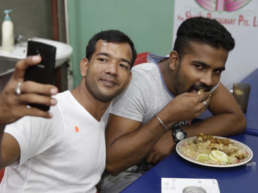 450 needy foreign workers set to get new phones ahead of 3G shift