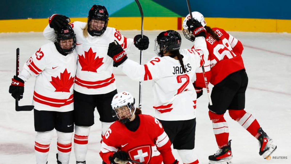 Ice hockey-Canada start title defence with win, Knight ties US record