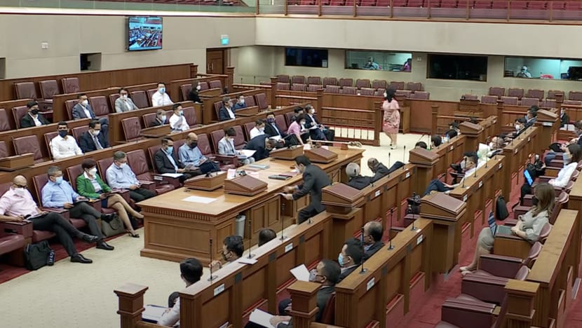 MPs sit together in Parliament's main chamber for first time in 2 years as some frontbenchers shift seats