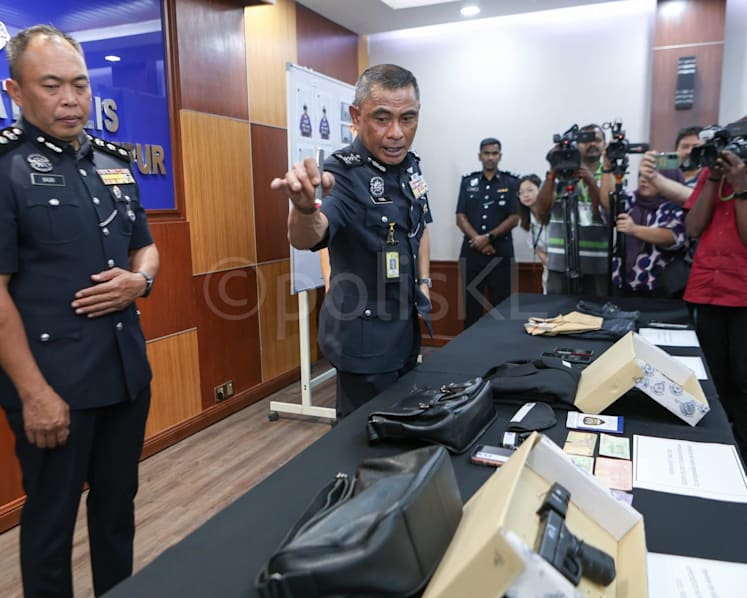 Malaysian senior cop among 6 nabbed for alleged armed robberies targeting wealthy foreigners; US$1.1 million stolen