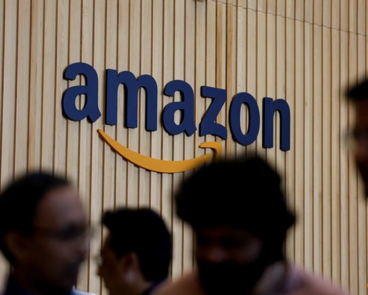 Amazon surges as US stocks shrug off bond yield worries