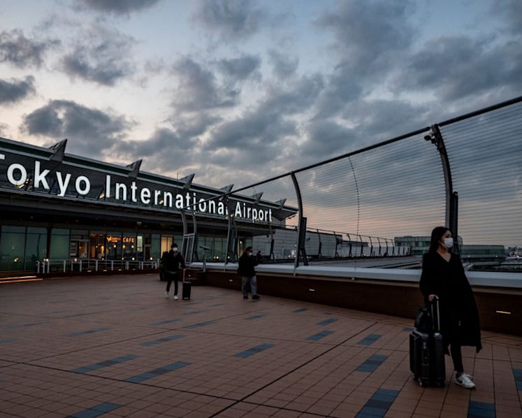 Japan to bar new foreign arrivals over Omicron COVID-19 variant