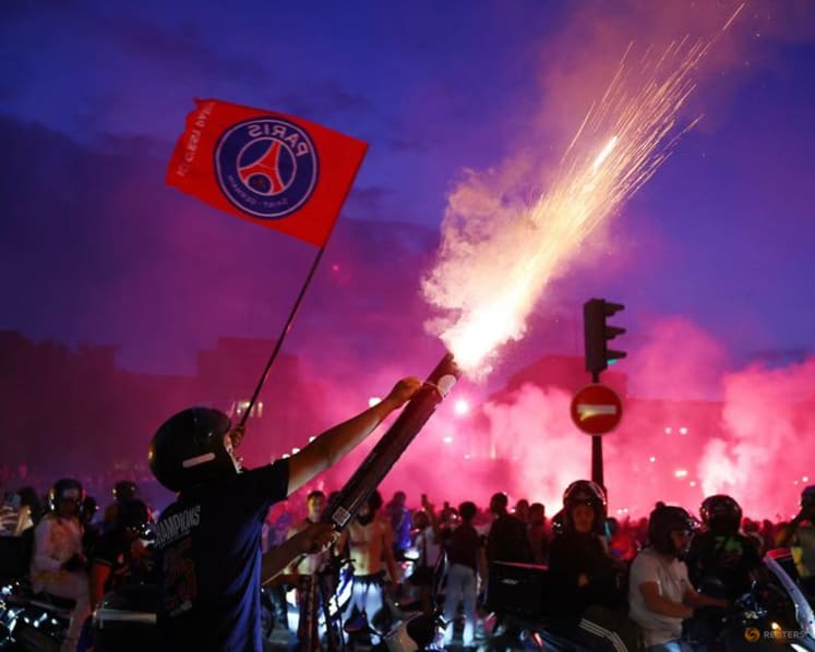 Jubilant PSG supporters spill onto Paris streets, some clashes with police