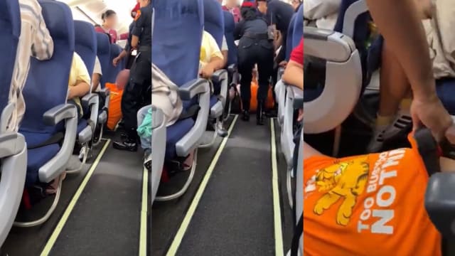 求换位不果在机上发飙 超重男被拖离泰国狮航