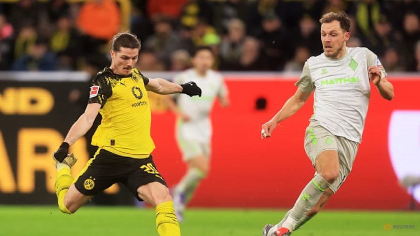 Dortmund ease past Werder 3-0 to stretch unbeaten run