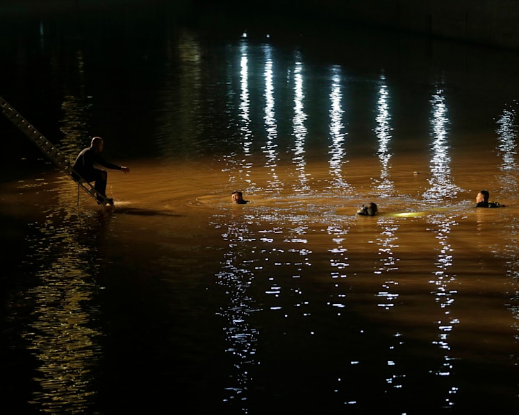 2 women killed after car plunges into Singapore River