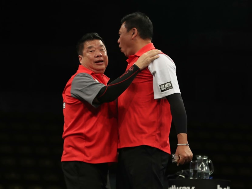 Paul Lim and Harith Lim have been representing Singapore in the World Cup of Darts since 2014 but have only reached the second round before this year. Photo: Professional Corporation of Darts Facebook Page