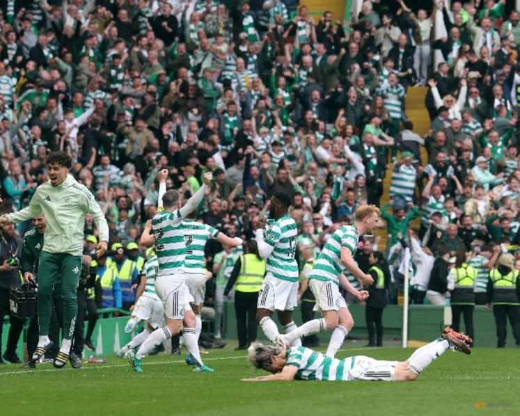 Celtic snatch title from Hearts with last-gasp victory on final day