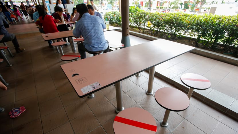 ‘I thought the seats were spoilt’: Some hawker centre patrons don’t know tape is for social distancing