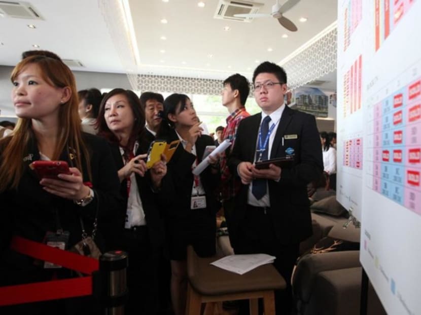 Property agents at a condominium launch before the pandemic.