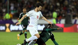Iran striker Azmoun kicked off national team for disloyalty, say reports