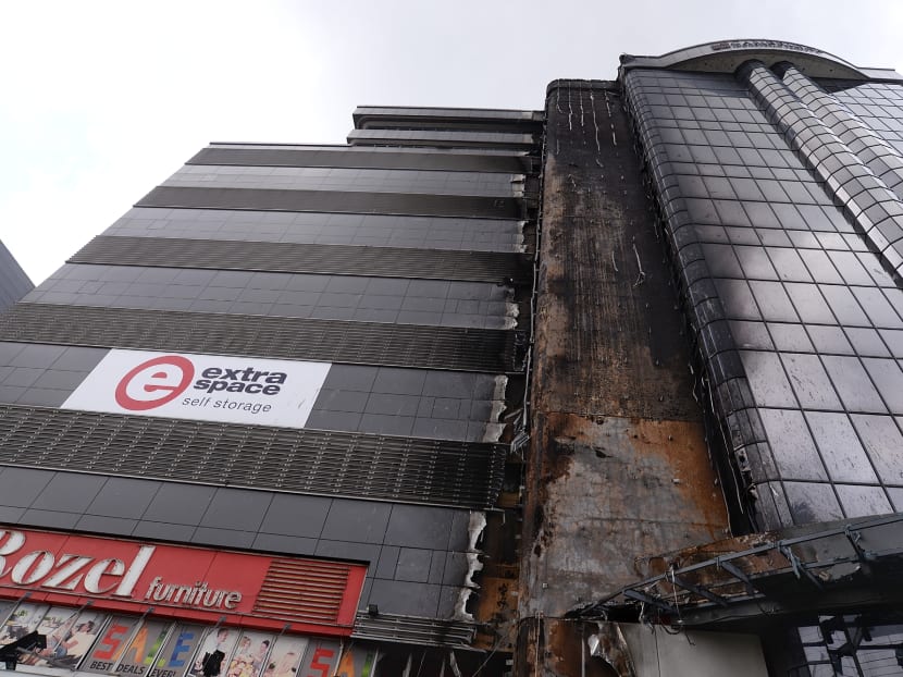 File photo of the aftermath at 30 Toh Guan Road where a warehouse fire occurred, at 10.30am on May 4, 2017. Photo: Robin Choo/TODAY File photo of the aftermath at 30 Toh Guan Road where a warehouse fire occurred, at 10.30am on May 4, 2017. Photo: Robin Choo/TODAY