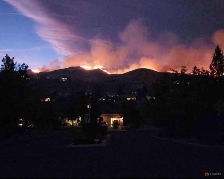 Tens of thousands evacuated as fire bears down on US city