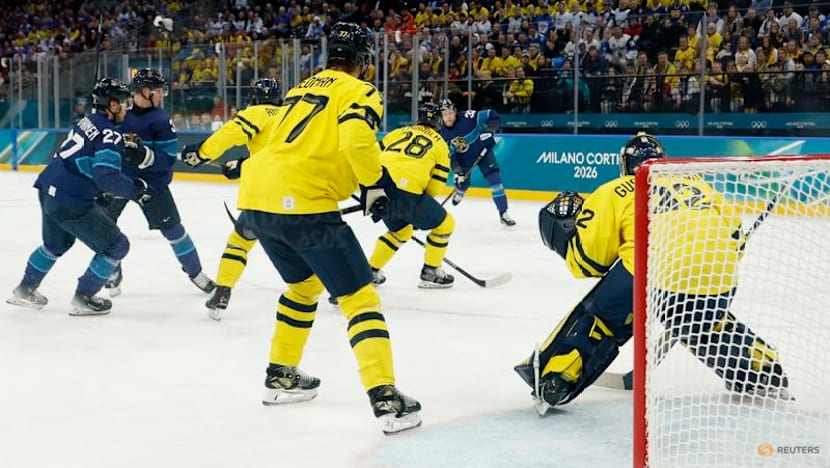 Ice hockey-Canada ease past Swiss, Finland beat Sweden, Slovakia, Czechs notch wins