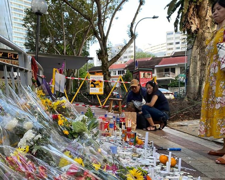 ‘I pray their souls will go to heaven’: One week after fatal Lucky Plaza accident, many come to pay respects