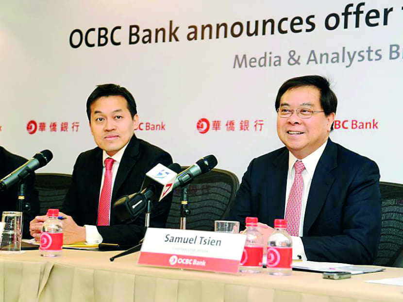 By acquiring Wing Hang, OCBC hopes to realise its overseas ambitions, said its Chief Financial Officer Darren Tan (left) and Chief Executive Officer Samuel Tsien. Photo: OCBC