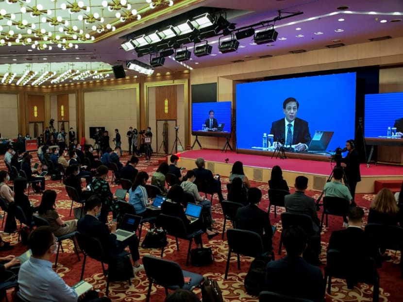 Mr Zhang Yesui, the spokesperson for the third session of the 13th National People's Congress, speaks during a video online press conference in Beijing on May 21, 2020.