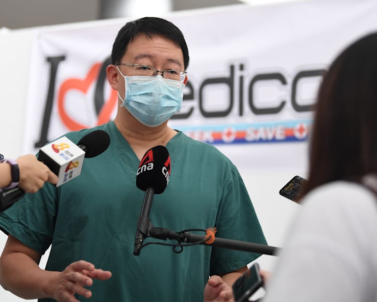 Some NSmen clock longer ICT cycle to care for 1,800 Covid-19 patients at Singapore Expo