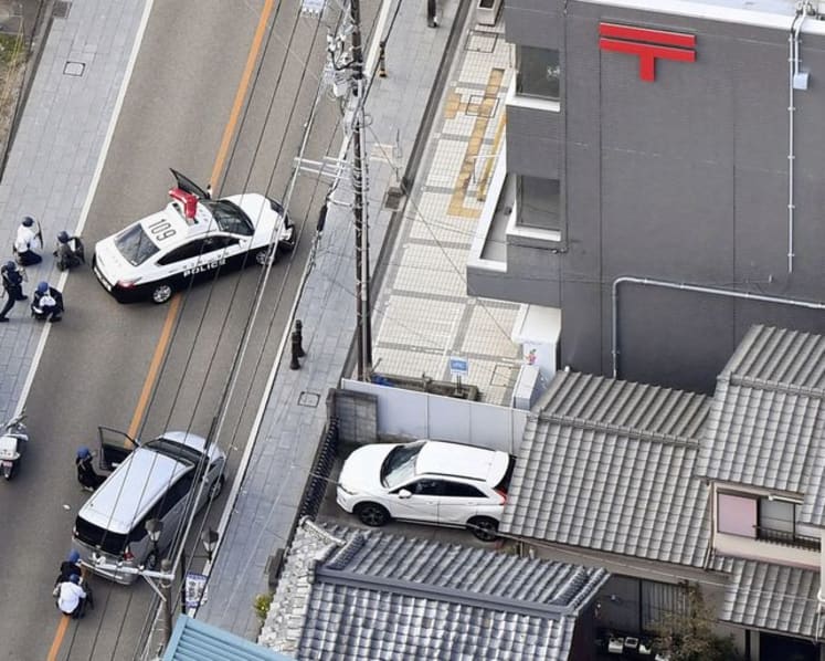 Japan police detain hostage-taker after hours-long standoff in post office