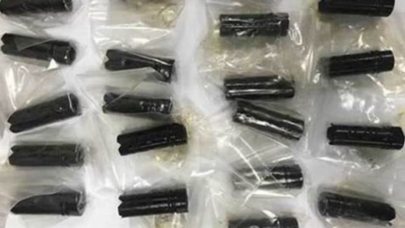 Police investigating 20 suspected gun parts found in postal parcel on transshipment
