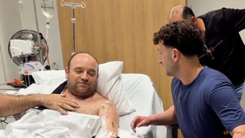 Australia's 'Bondi Hero' handed US$1.65 million collected from fundraising