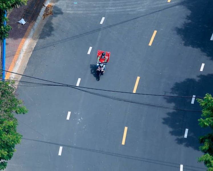 Vietnam puts southern region in lockdown as COVID-19 surge grows 