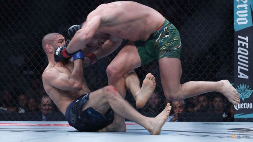 Relentless Chimaev beats du Plessis to win UFC middleweight title