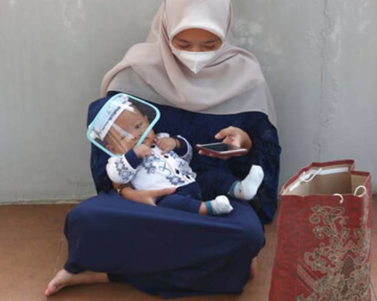 Pregnant mums in Indonesia face health risks, anxiety amid cases of maternal deaths linked to COVID-19