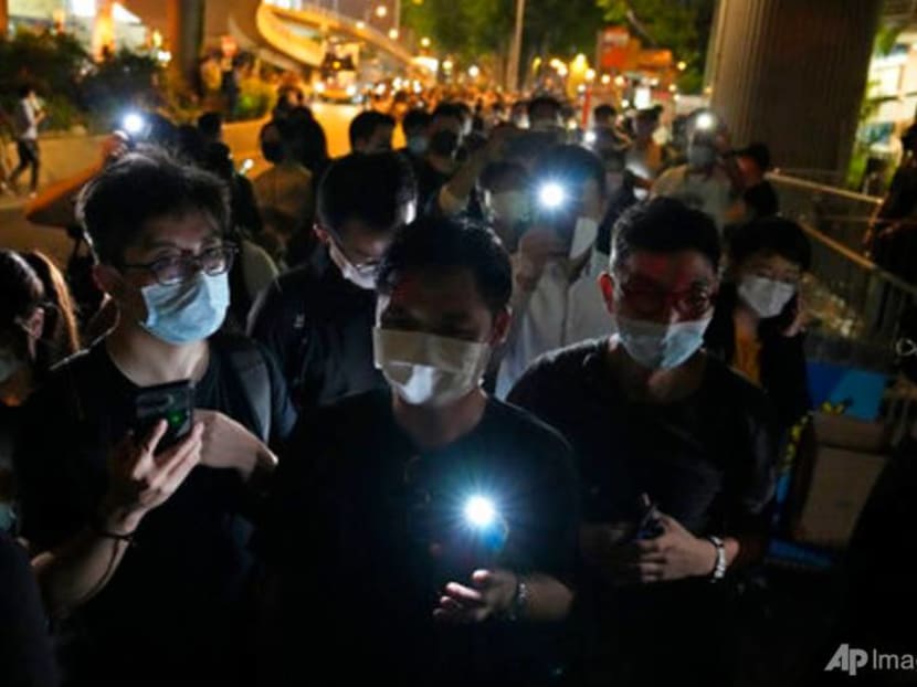 Hong Kong pro-democracy group downsizes amid crackdown