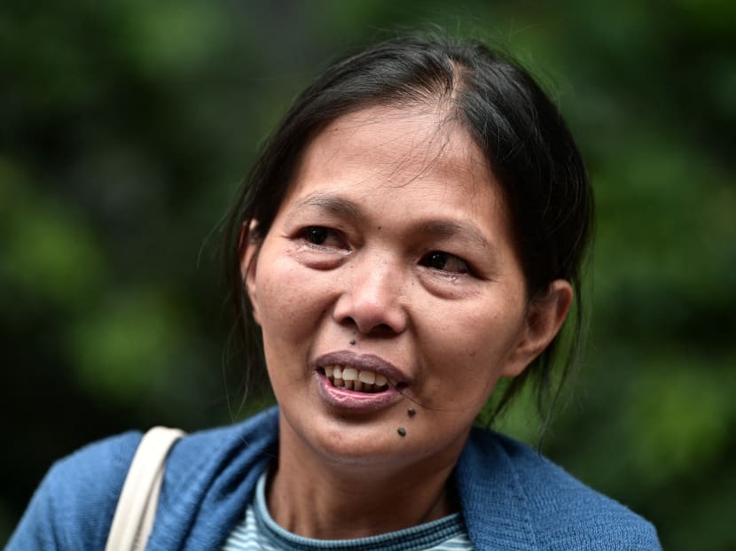 In this file picture taken on on April 15, 2019, Baby Jane Allas reacts after a hearing at the Labour Tribunal in Hong Kong, which ordered her former employer to pay a settlement of HK$30,000 (S$5,200) in damages.