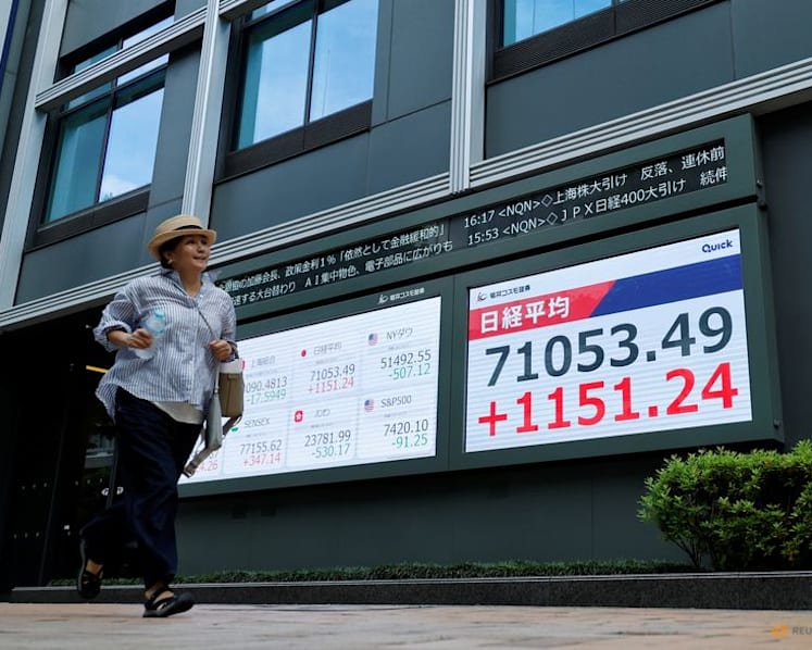 Japan, South Korea stocks hit records as oil prices fall