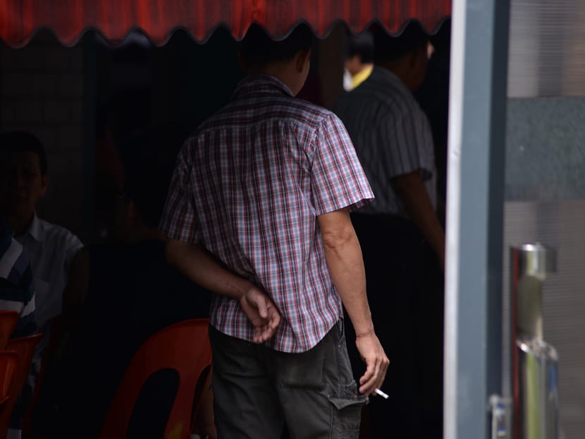 A man smoking a cigarette outdoors on Feb 16, 2023. A man smoking a cigarette outdoors on Feb 16, 2023.