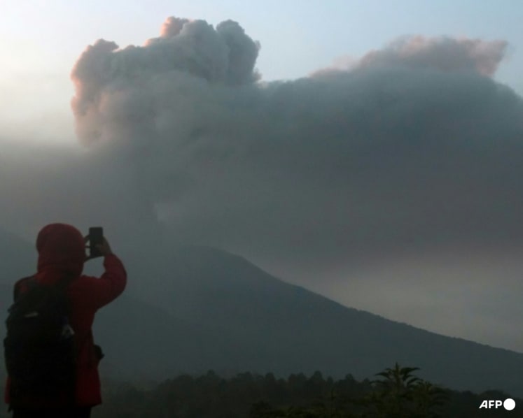 Visiting volcanoes big business in Indonesia but safety in spotlight after several eruptions including Marapi