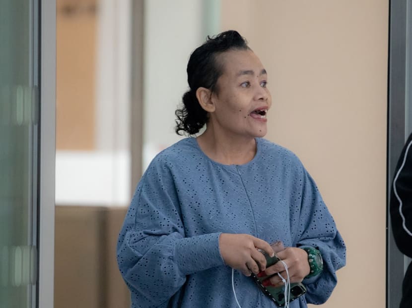 Siti Aidah Abdullah leaving the State Courts on April 5, 2023. Siti Aidah Abdullah leaving the State Courts on April 5, 2023.