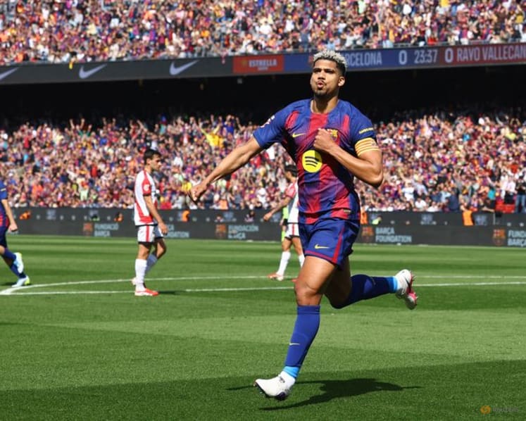Liverpool bolster injury-hit defence with loan signing of Barca's Araujo