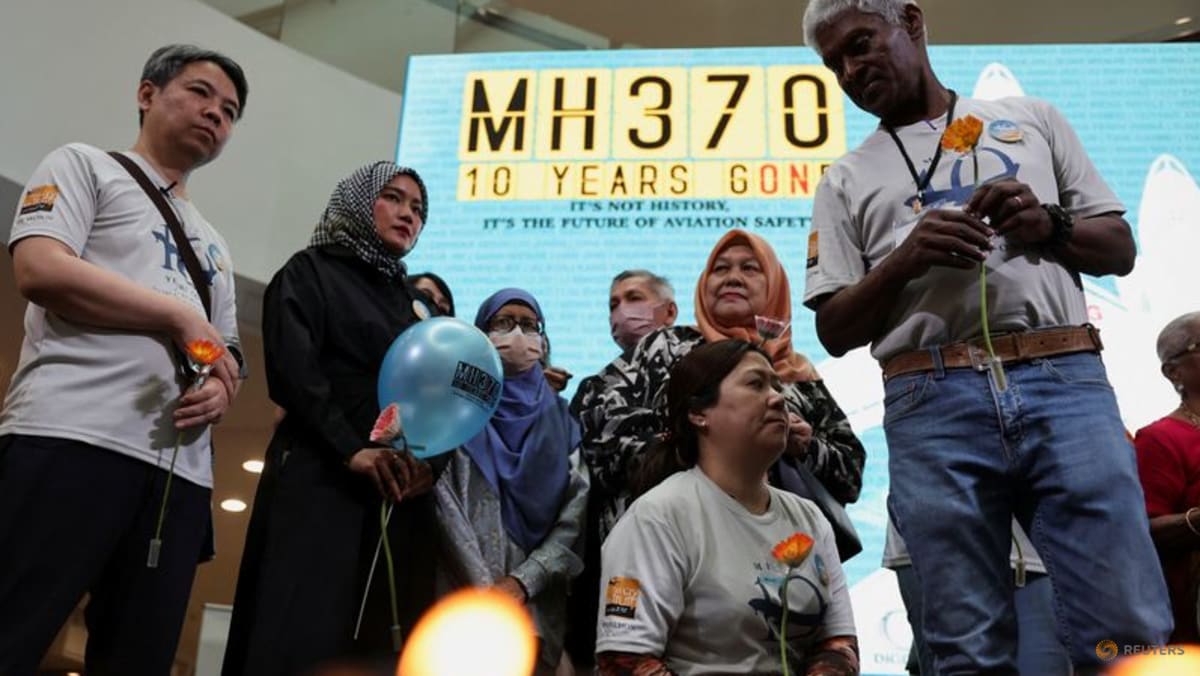 Search for missing flight MH370 to resume this month, Malaysia says