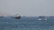 Wall Street Wavers as Oil Slides on Fragile Iran Ceasefire, but Earnings Buoy Nasdaq to New High — image 3