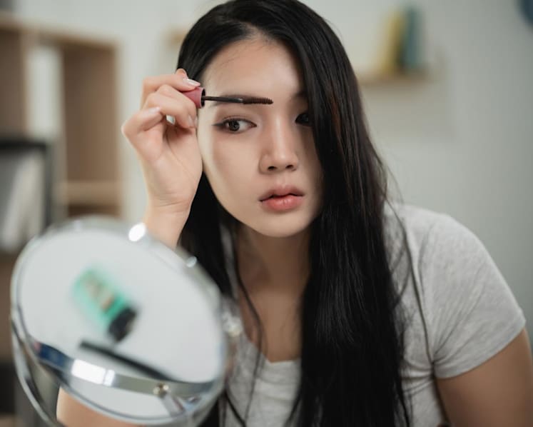 I tell my son he is perfect as he is – so what does he see when he looks at my bleached-blonde hair and makeup?