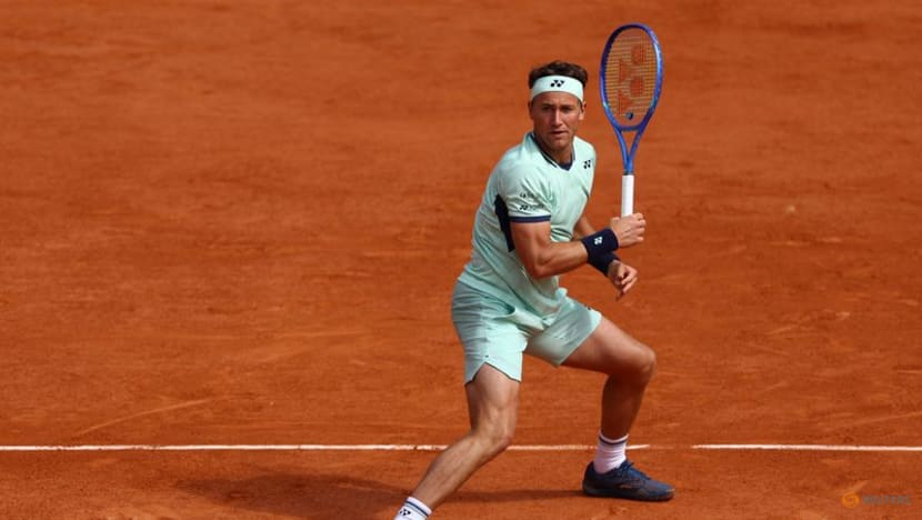 Ruud recovers from Rome mauling for winning start at French Open