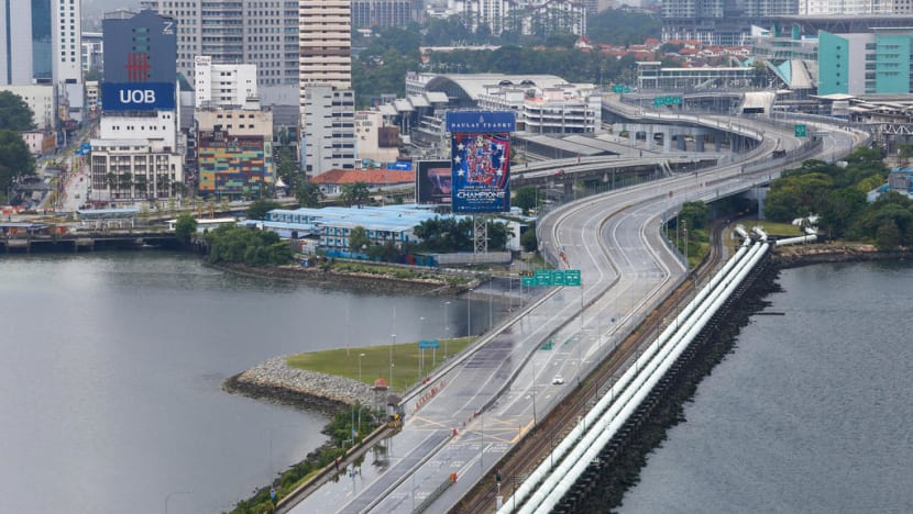 ‘In-principle understanding’ that M’sian work permit holders can enter S’pore during lockdown: Lawrence Wong