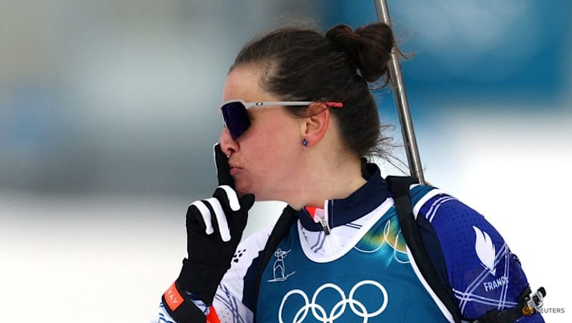 Biathlon-Simon shushes media critic after another golden win