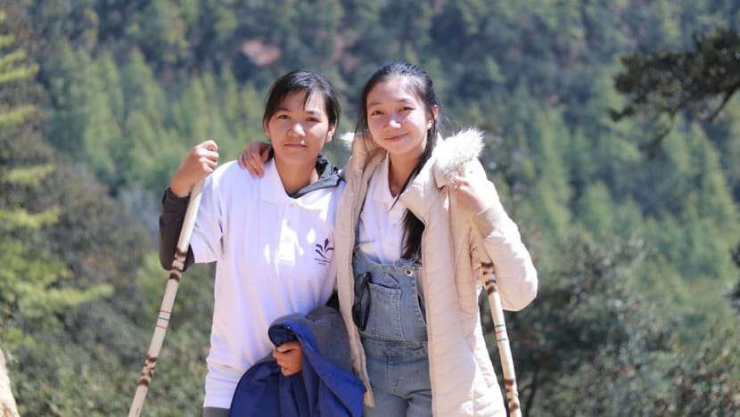 Young Cambodian women on green mission to build roads with plastic waste Young Cambodian women on green mission to build roads with plastic waste