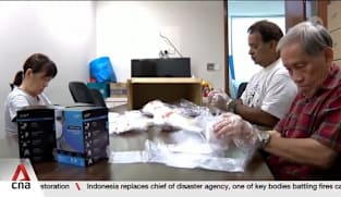 A hive of activity at CCs as residents collect free masks, seek respite in haze shelters