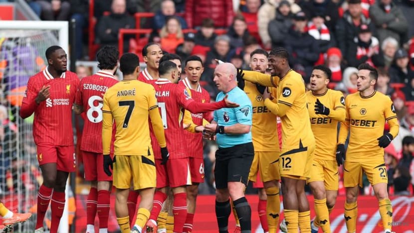 Liverpool edge past Wolves to go seven points clear at top
